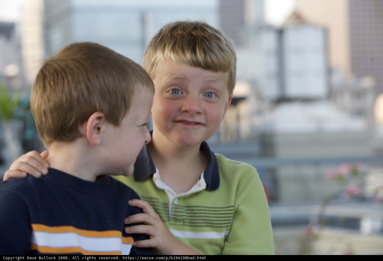 Two Boys Gazing at the Cityscape