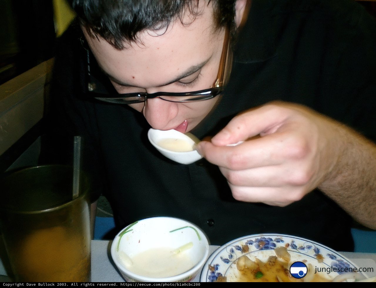 A Man Savoring His Meal