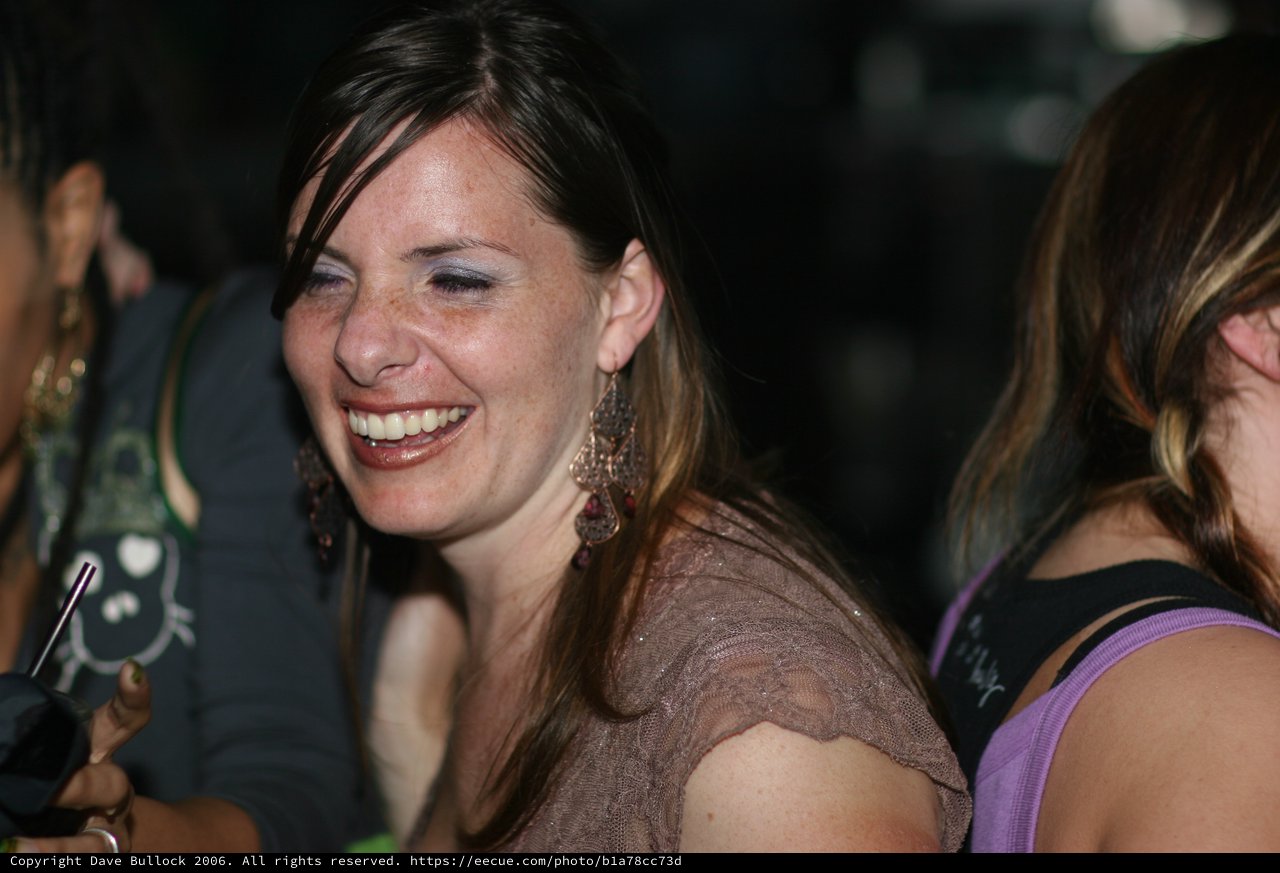 Joyful Woman Laughing at Nightclub Event 2006