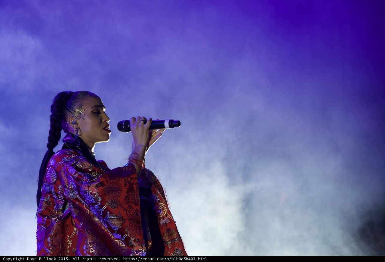 FKA twigs Beautiful Upper Body Profile Singing Eyes Closed Baby Hairs Swirls Hoop Earrings Red Lipstick Braided Ponytail Rings Kimono Red Brocade Gold Patterns Purple Blue Lighting Heavy White Haze