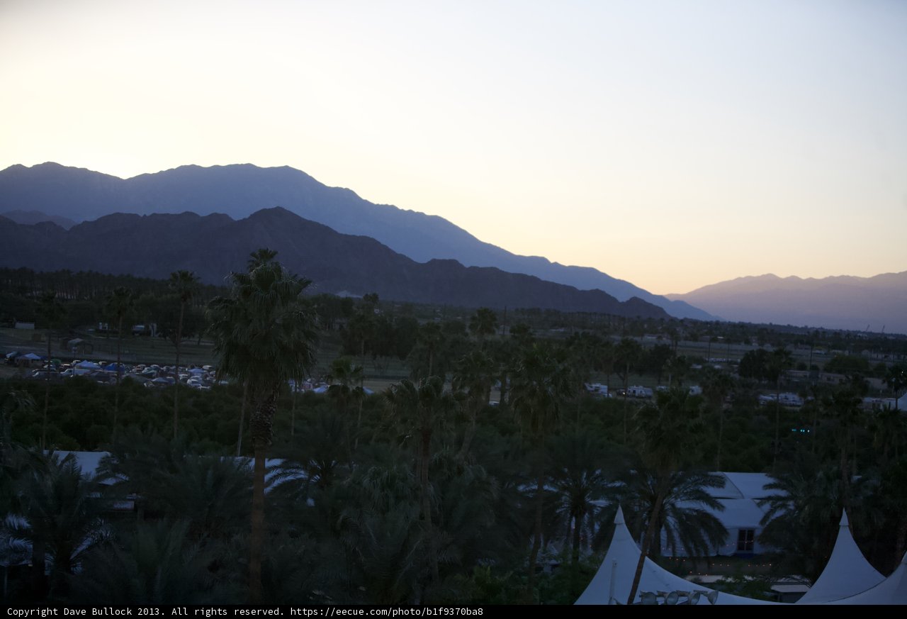 Sunset over the Mountains and Palm Trees