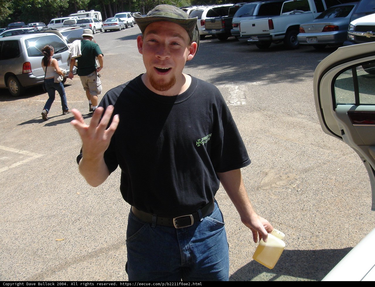 Black Shirt Man at the SUV