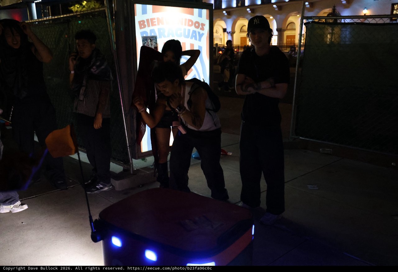 Night Festival Crowd Near Paraguay Welcome Sign