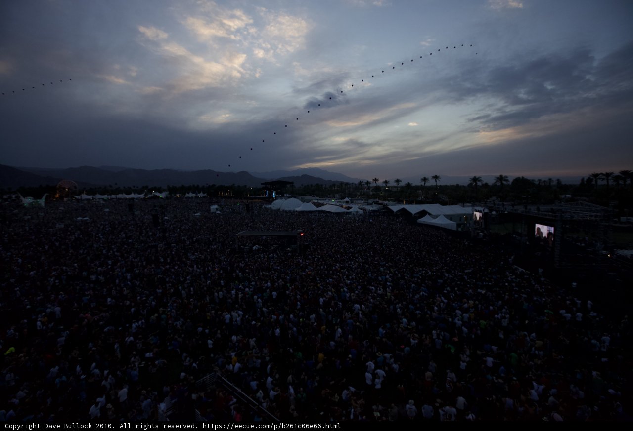 Concertgoers Shine Under Twilit Sky