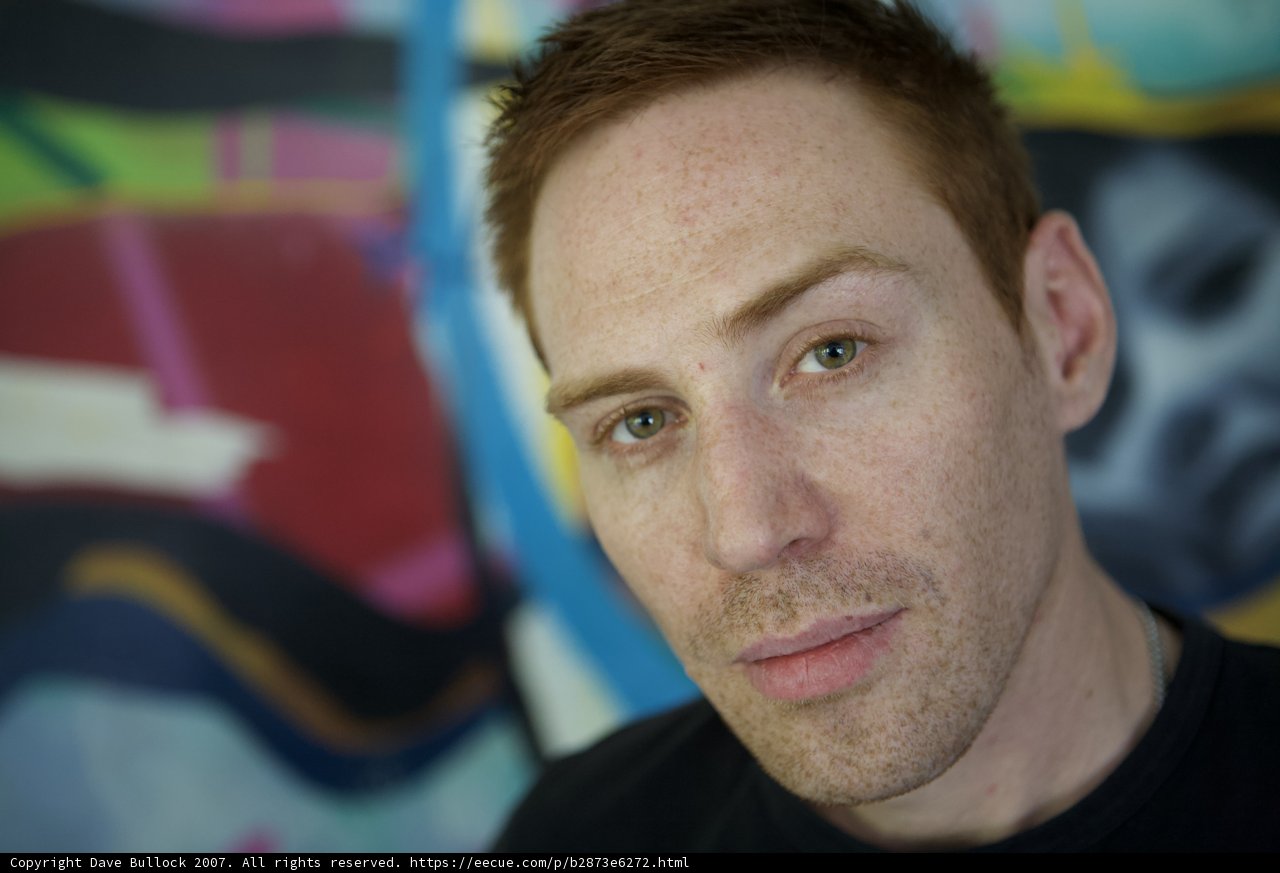 Freckled Man in Black Shirt
