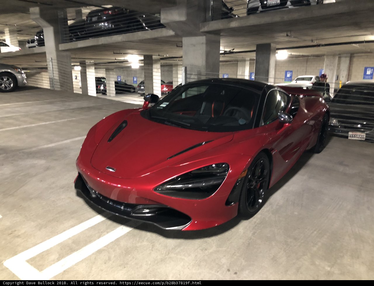 Red McLaren Coupe in Parking Garage