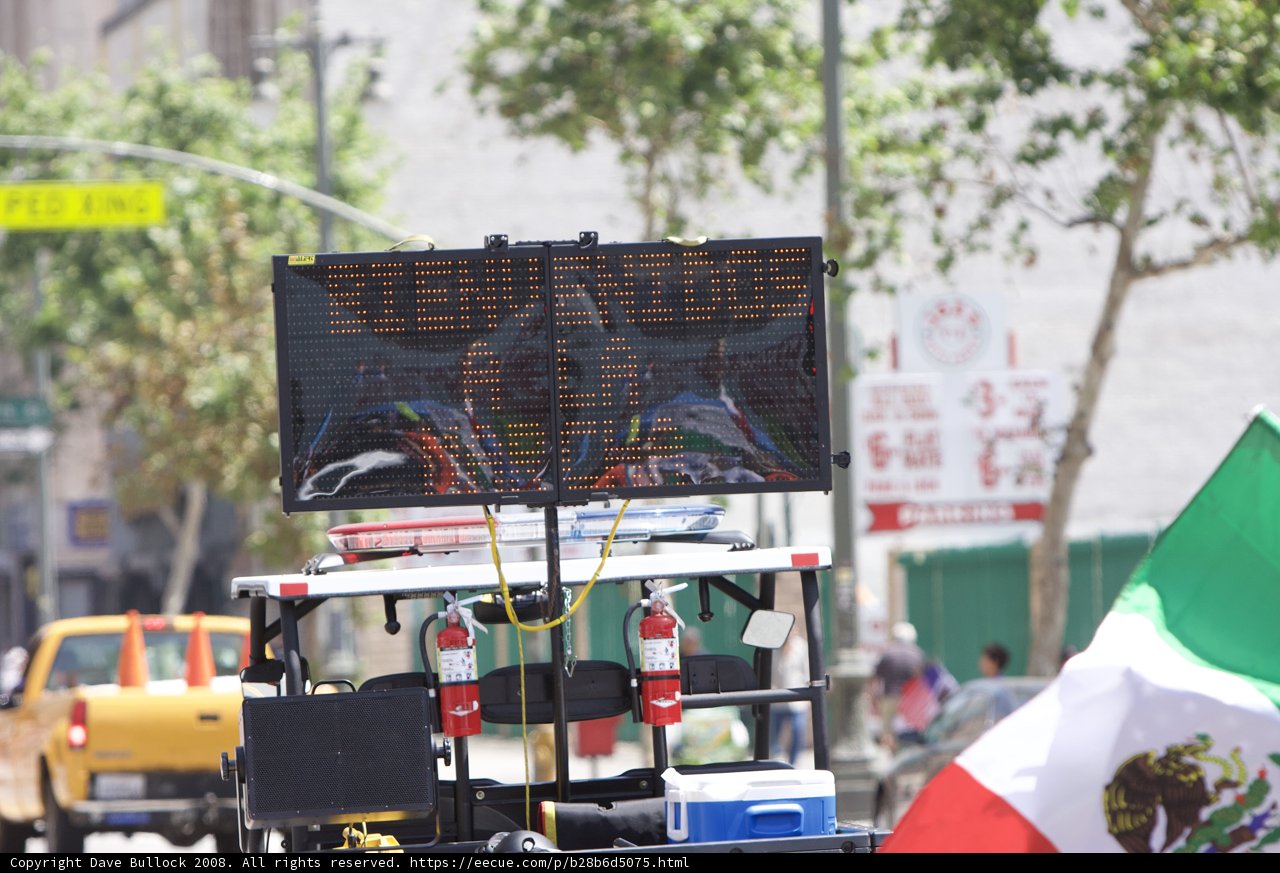 Mayday Protesters Gather Around Street Sign