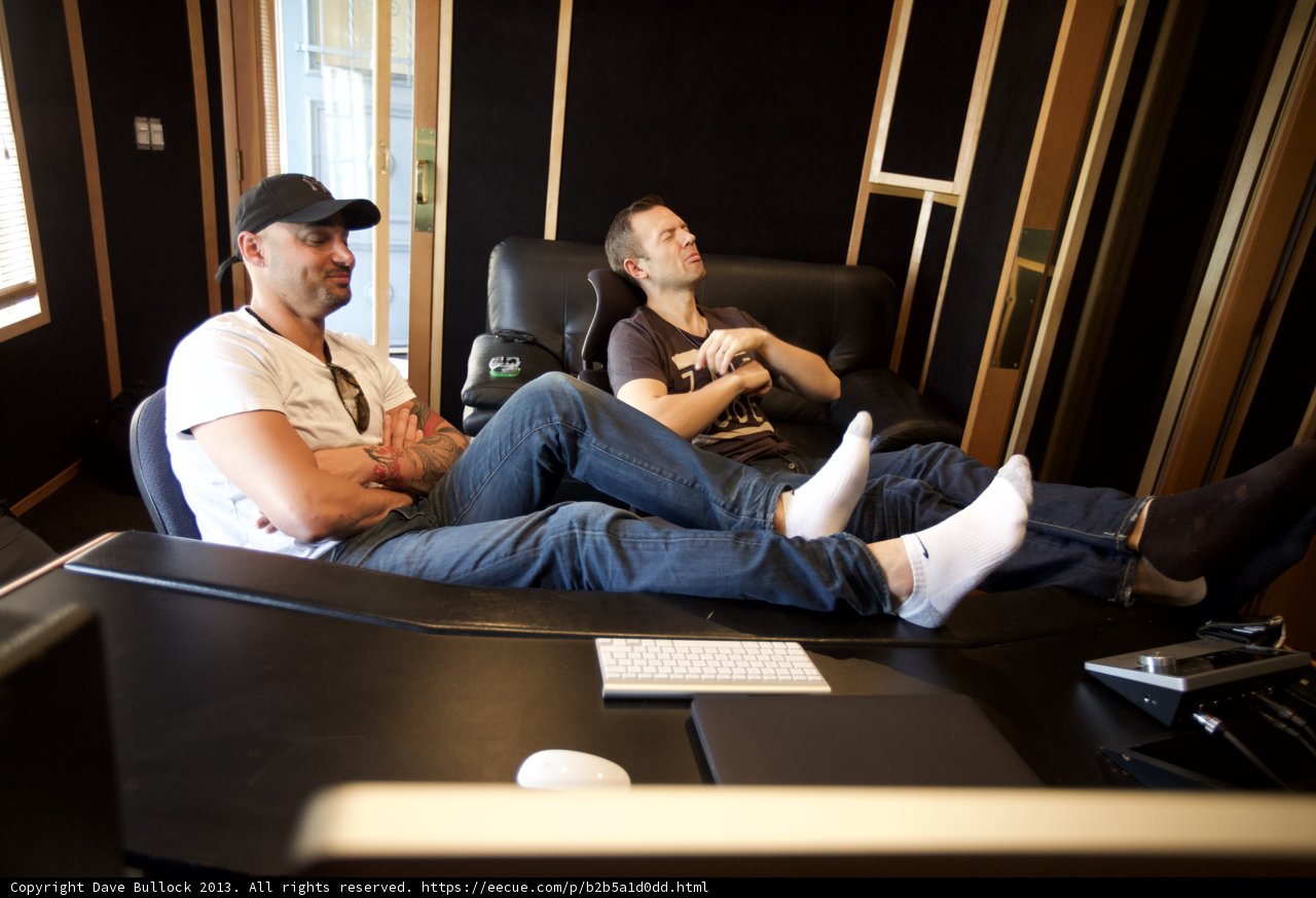 Two Men Take a Break in the Recording Studio