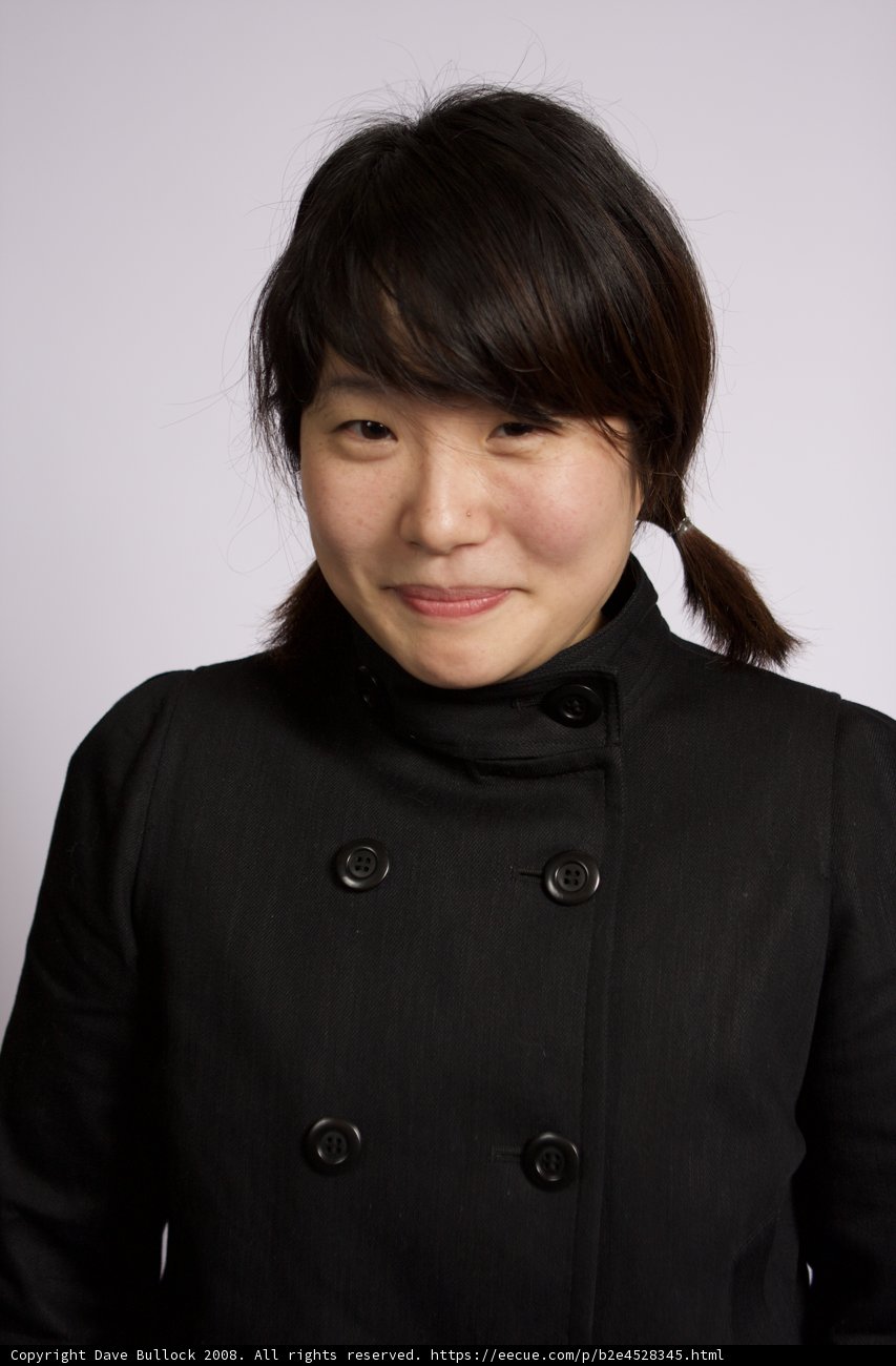 Mysterious Woman in Black Coat