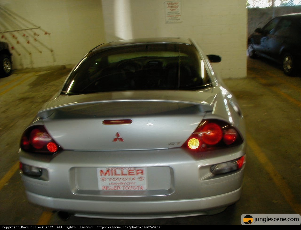 Silver Sports Car in Parking Garage