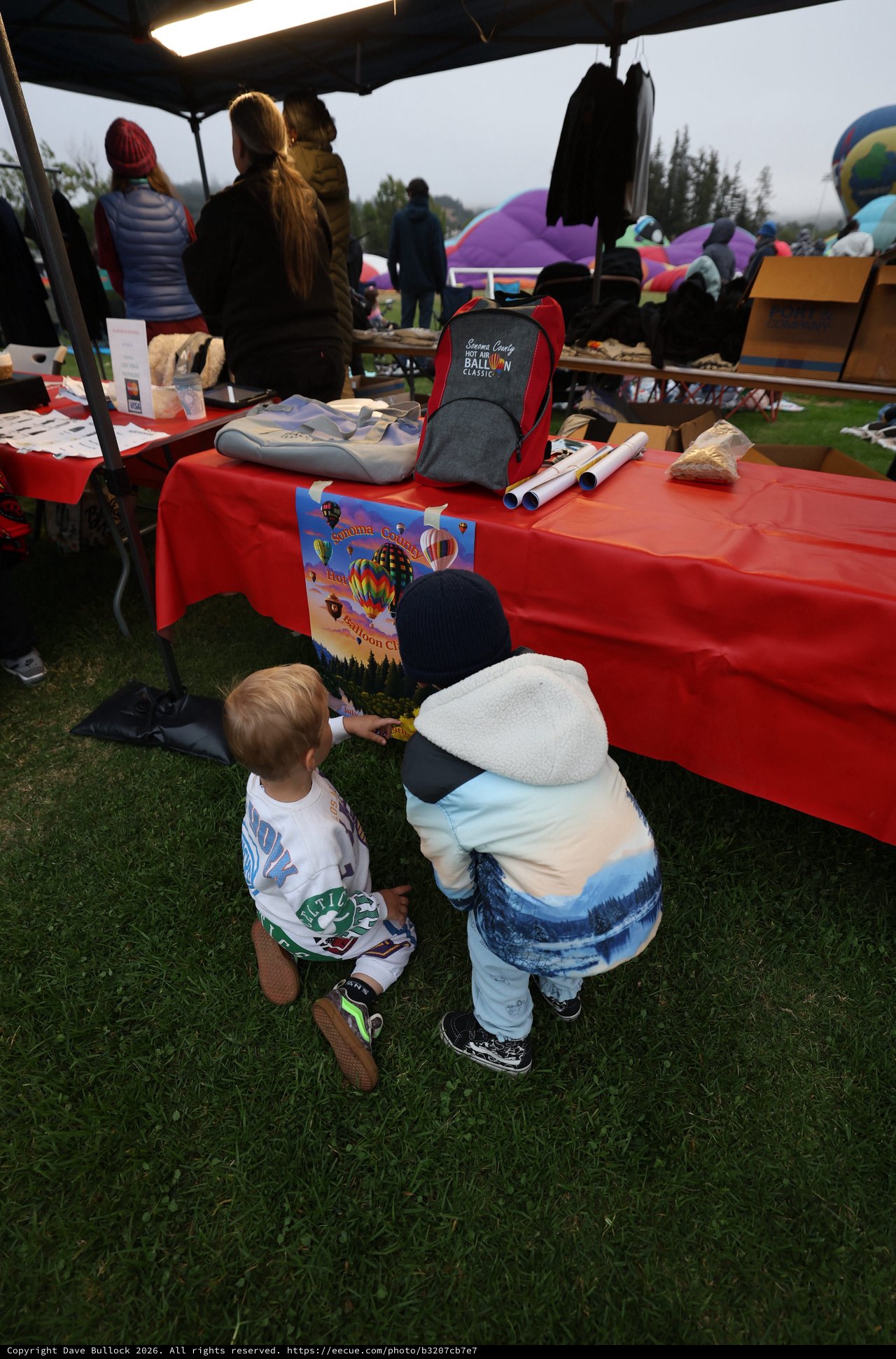 Young Children Explore Hot Air Balloon Festival Booth