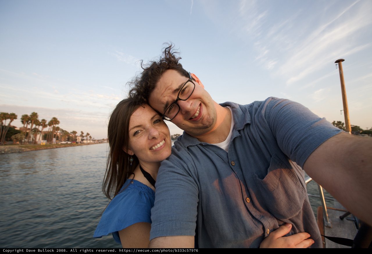 Couple's Joyful Selfie on a Summer Waterway