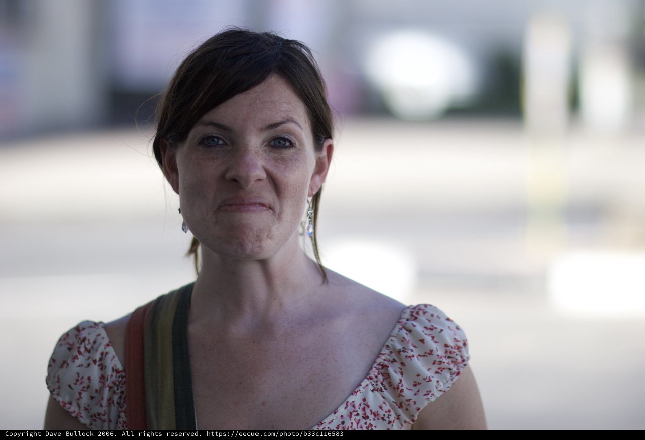 Woman with Skeptical Expression Outdoors in Summer