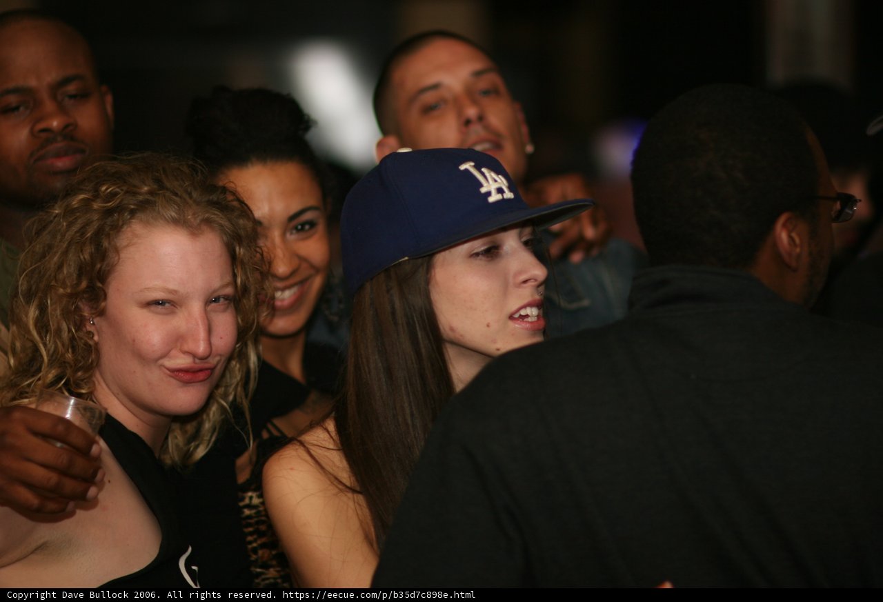 Blue-Hatted Lady at a Party