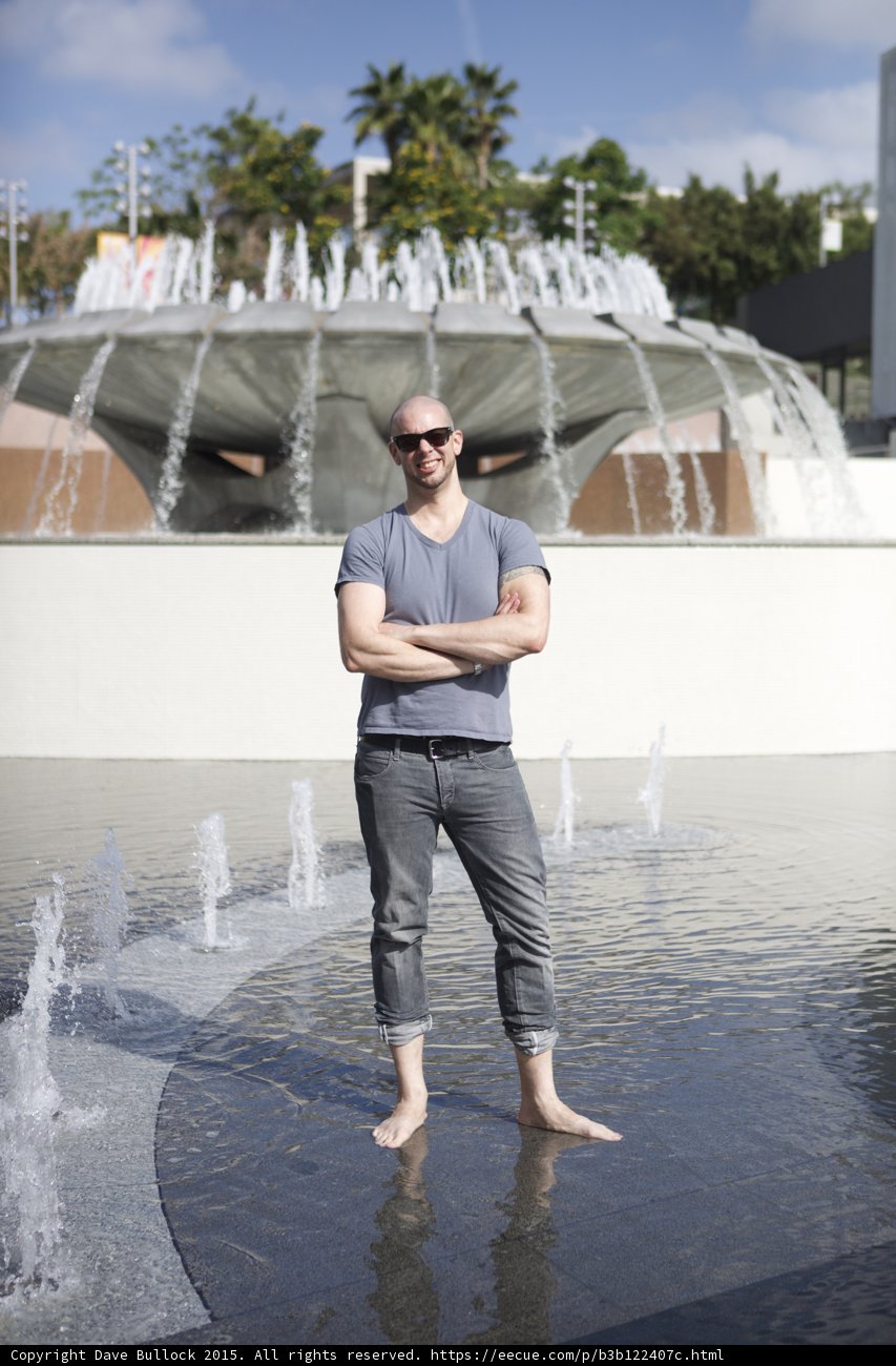Arms Crossed at Fountain