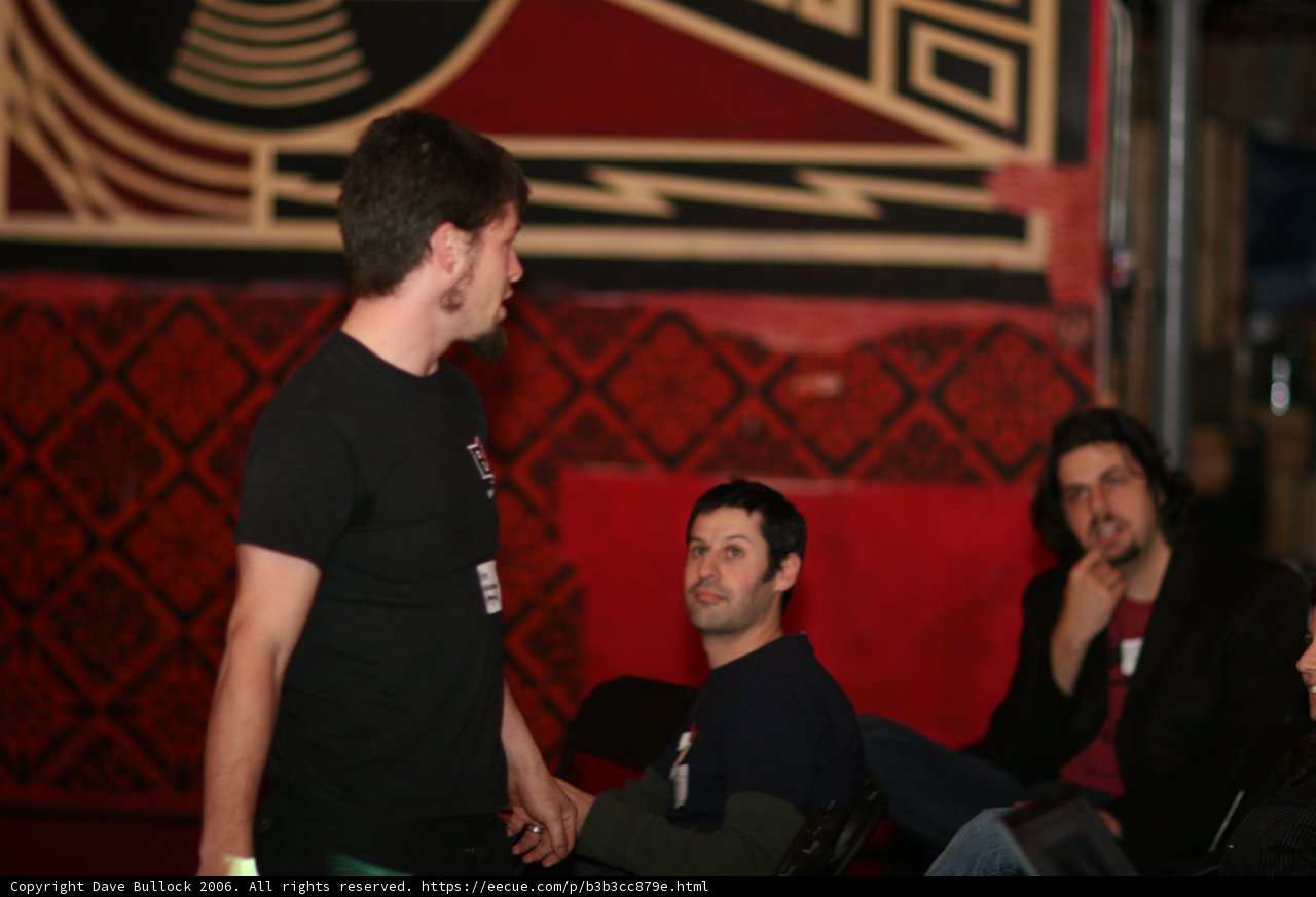 Man in Black Shirt Socializing at BarCamp