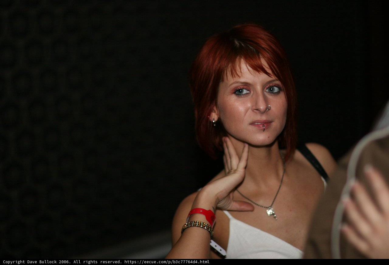Redhead in White: An Elegant Portrait