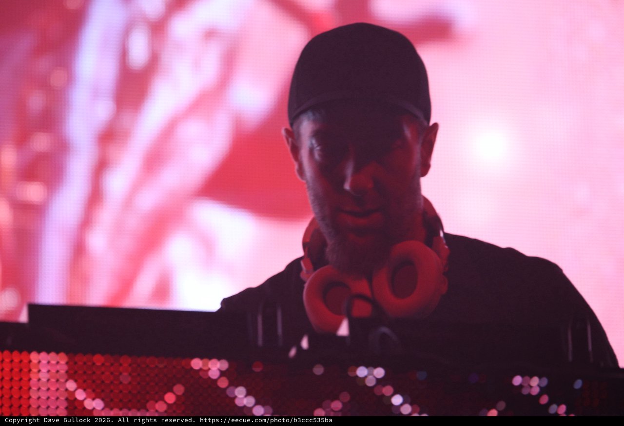 DJ Silhouette Bathed in Red Stage Light