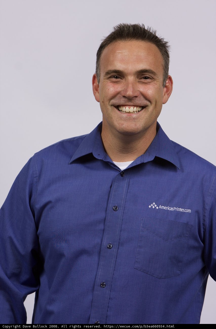 Smiling Man in Blue