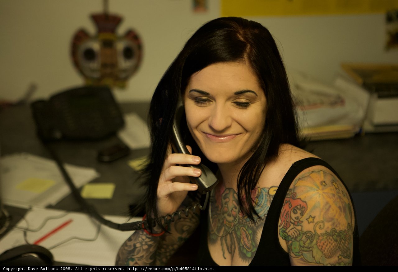 Tattooed Woman on the Phone
