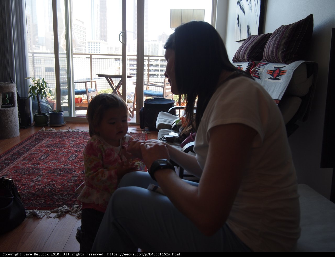 Mother and Child Enjoying Time Together with Remote Control