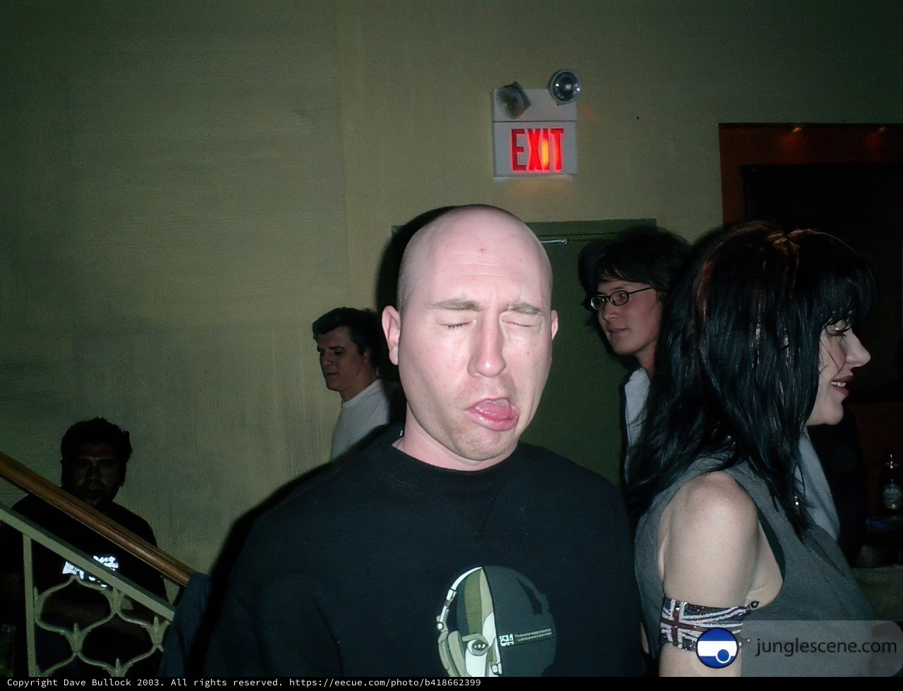 Bald-Headed Man Climbing Stairs
