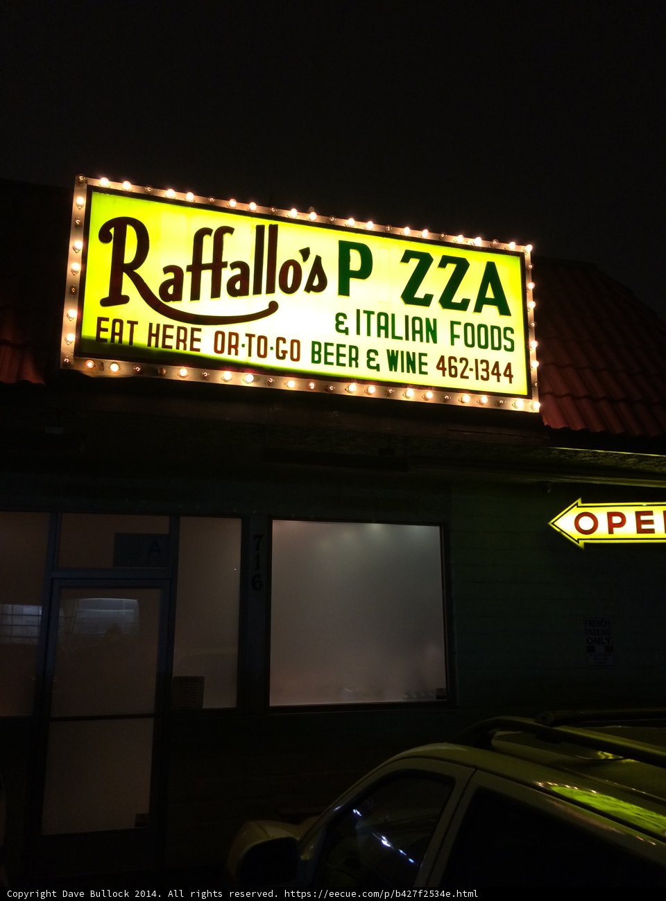 Raffalo's Pizza Sign Shines Brightly in the Night Sky