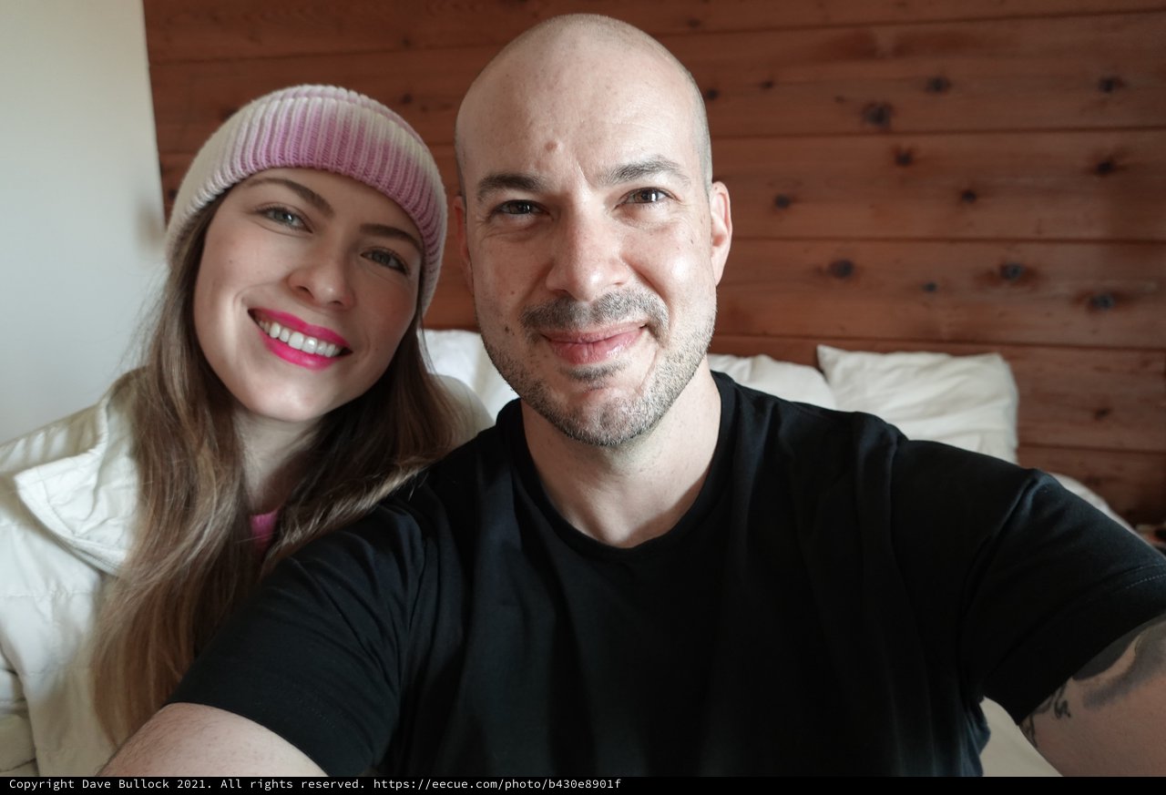 Cozy Couple's Selfie in Modern Bedroom