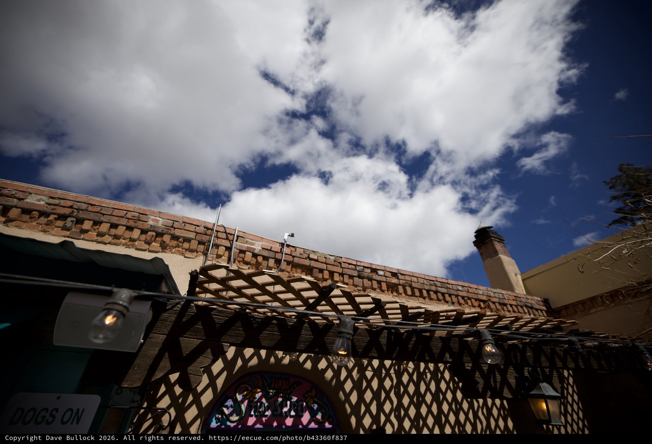 Southwestern Adobe Architecture Against Dramatic Sky