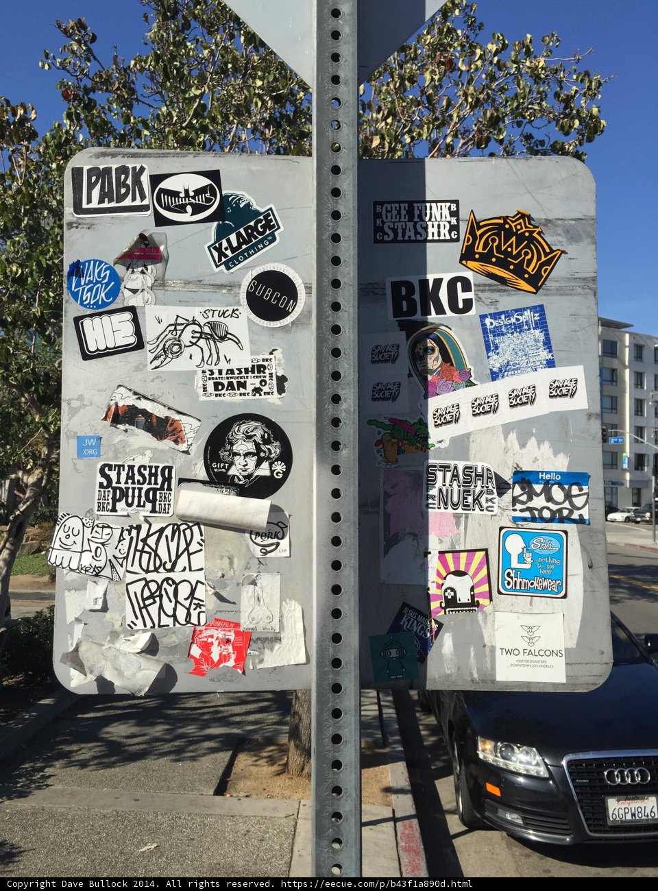 Stickers Galore on Los Angeles Street Sign