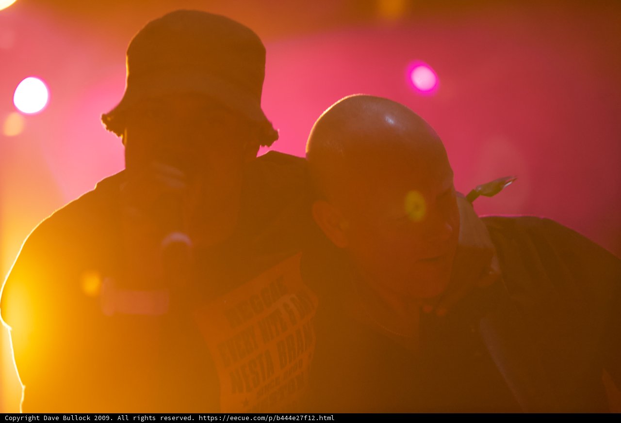 Two Men Singing and Supporting Each Other at Coachella 2009
