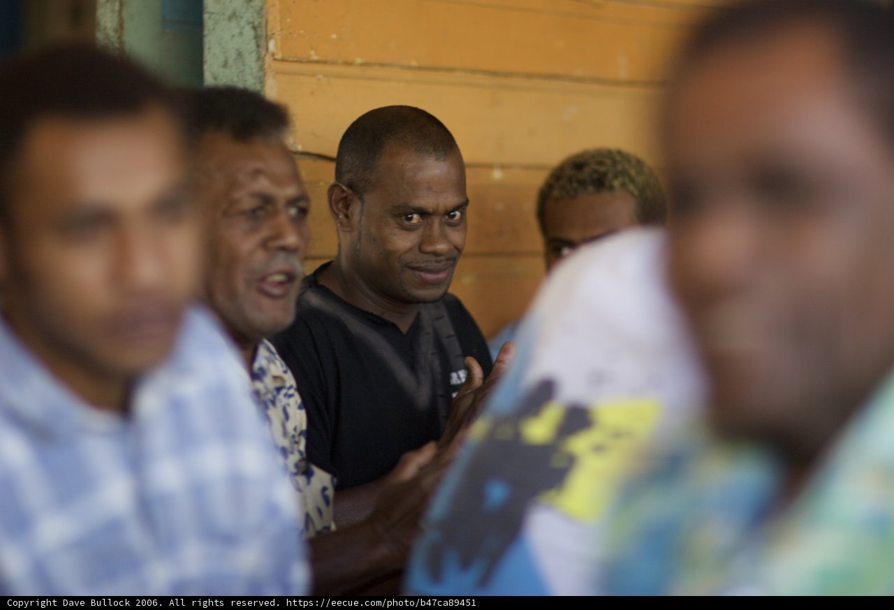 Group of Men Gathered Together