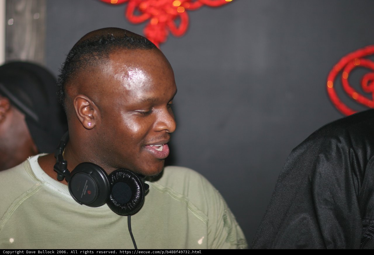 Two Men Grooving to the Beat