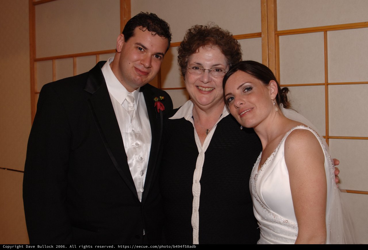 Bride and Groom Celebrate with Family at Wedding