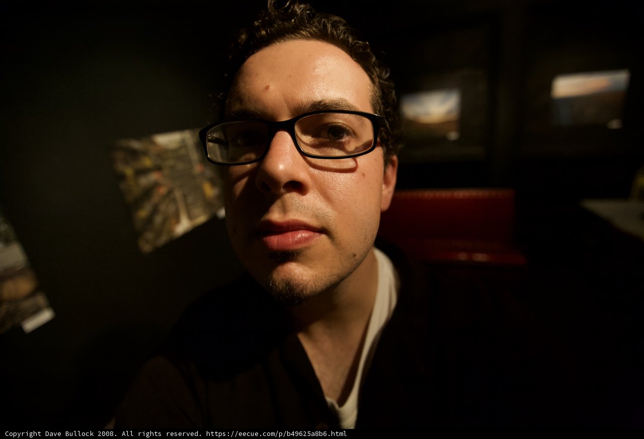 The Happy Man with Glasses