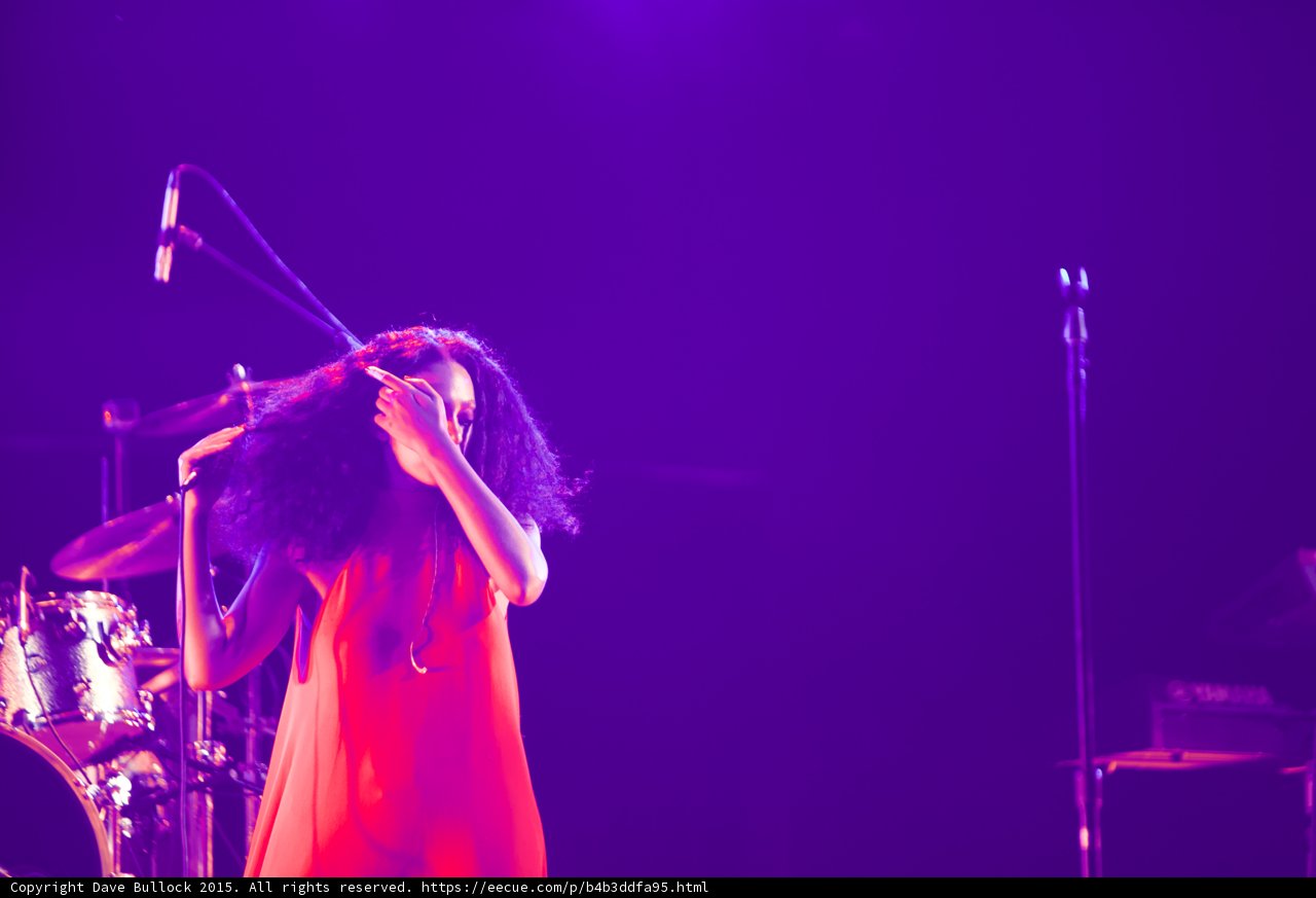 Solange Touching Hair Both Hands Red Dress Drum Kit Purple Haze