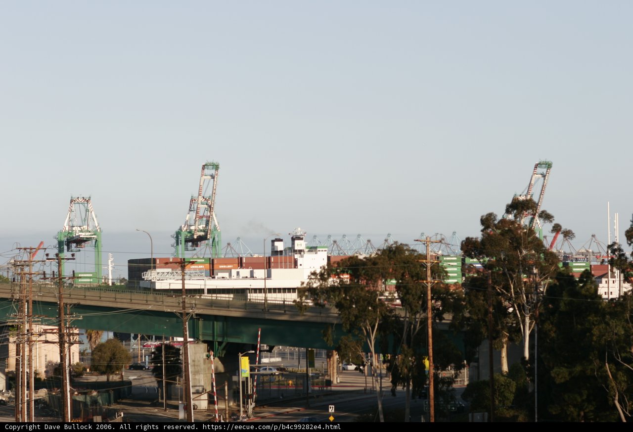 Cityscape with Bridge, Train, and Waterfront