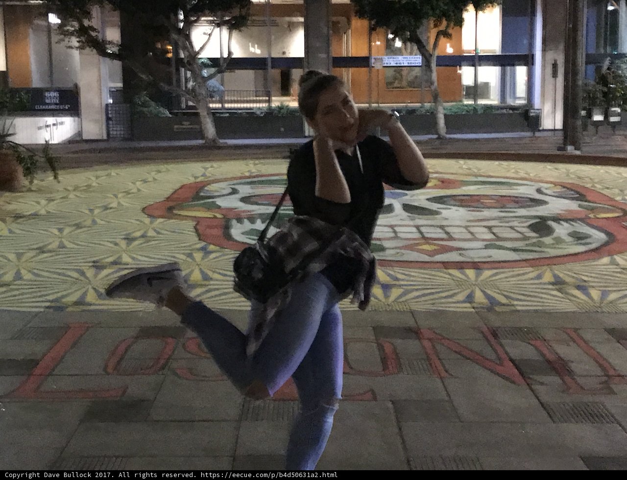Jumping for Joy in front of Murals