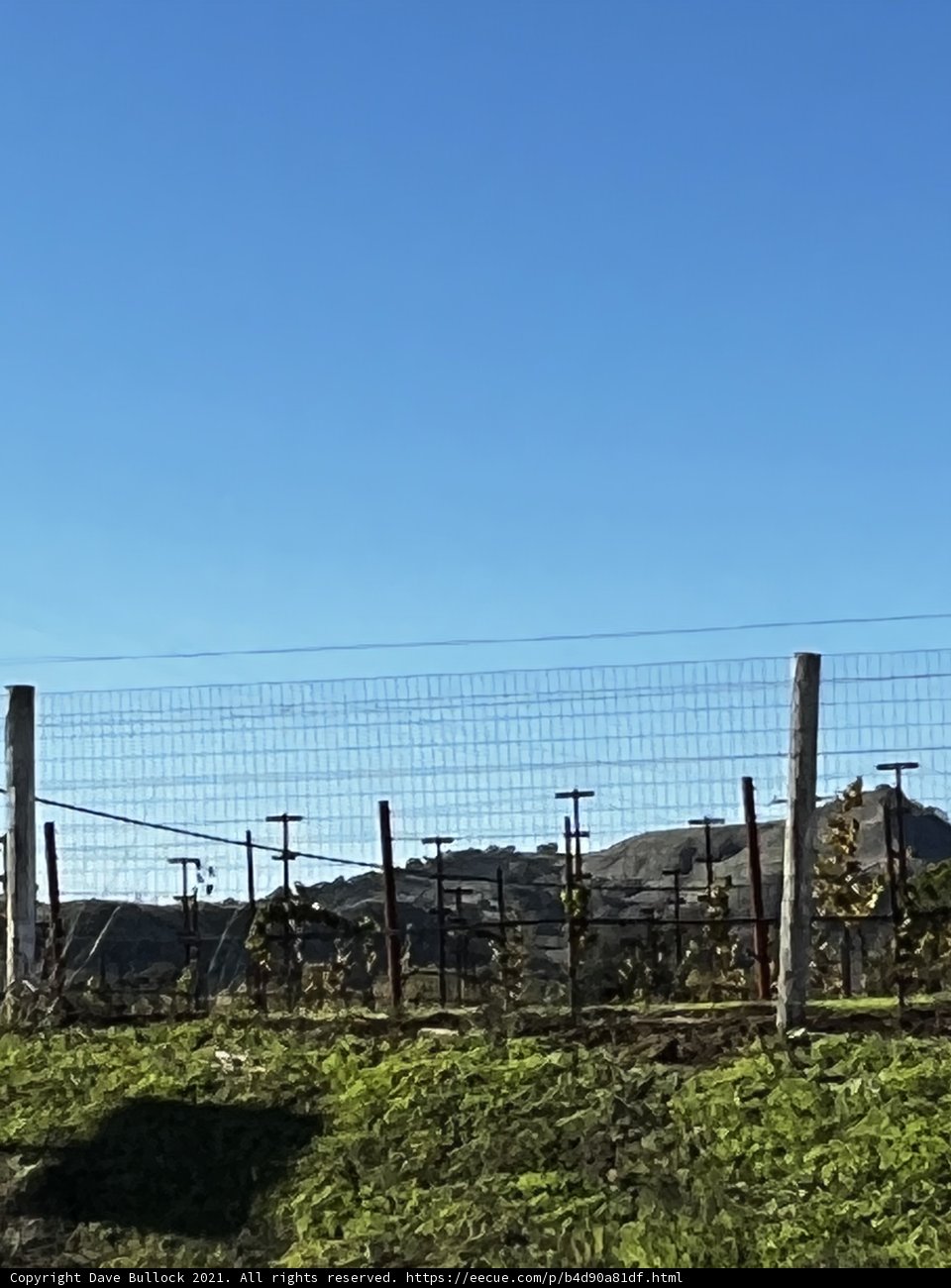 Rural Fence against a Picturesque Hill