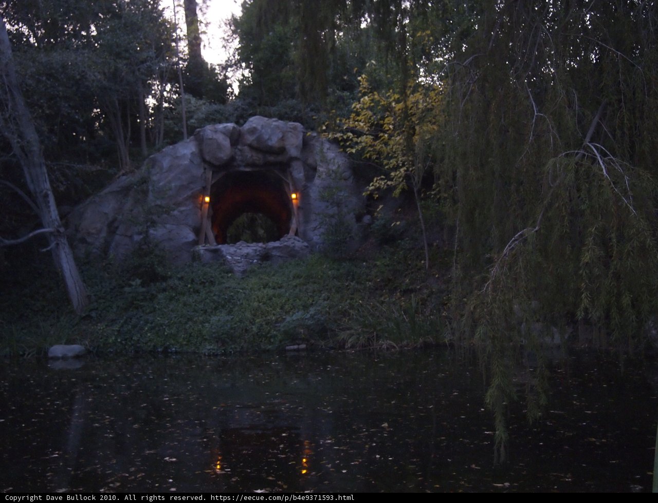Illuminated Cave in the Forest