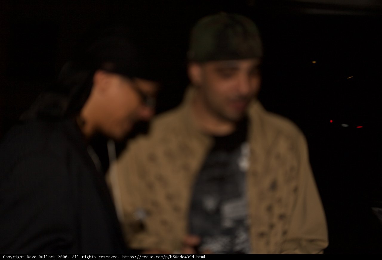 Two Men in Beanie Hats and Coats