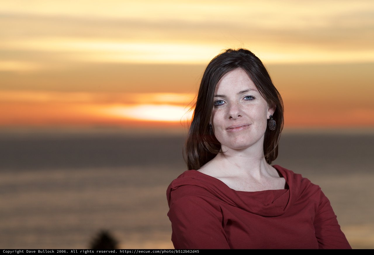 Woman at Golden Sunset by the Sea