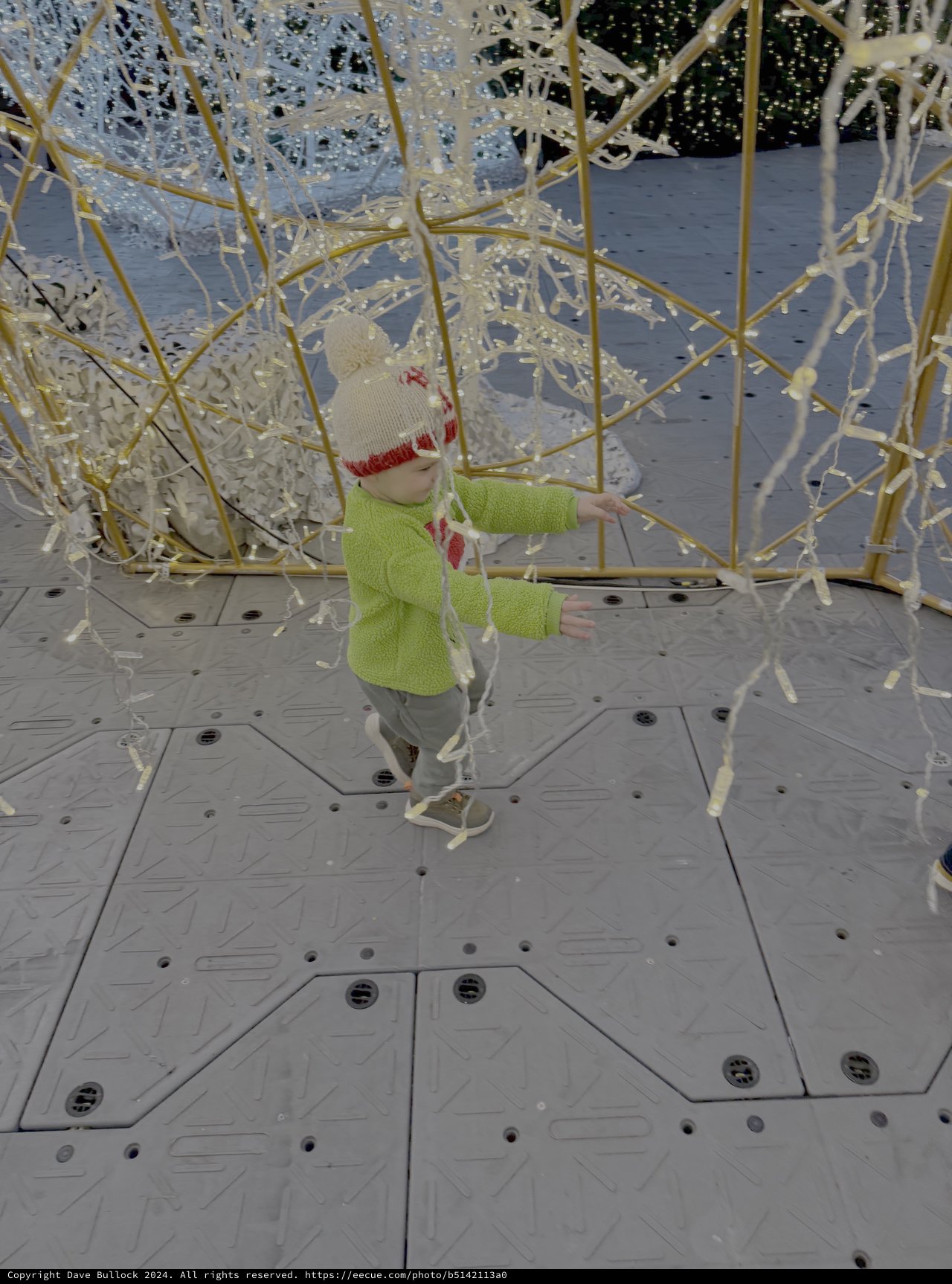 Child Playing in Interactive Art Installation