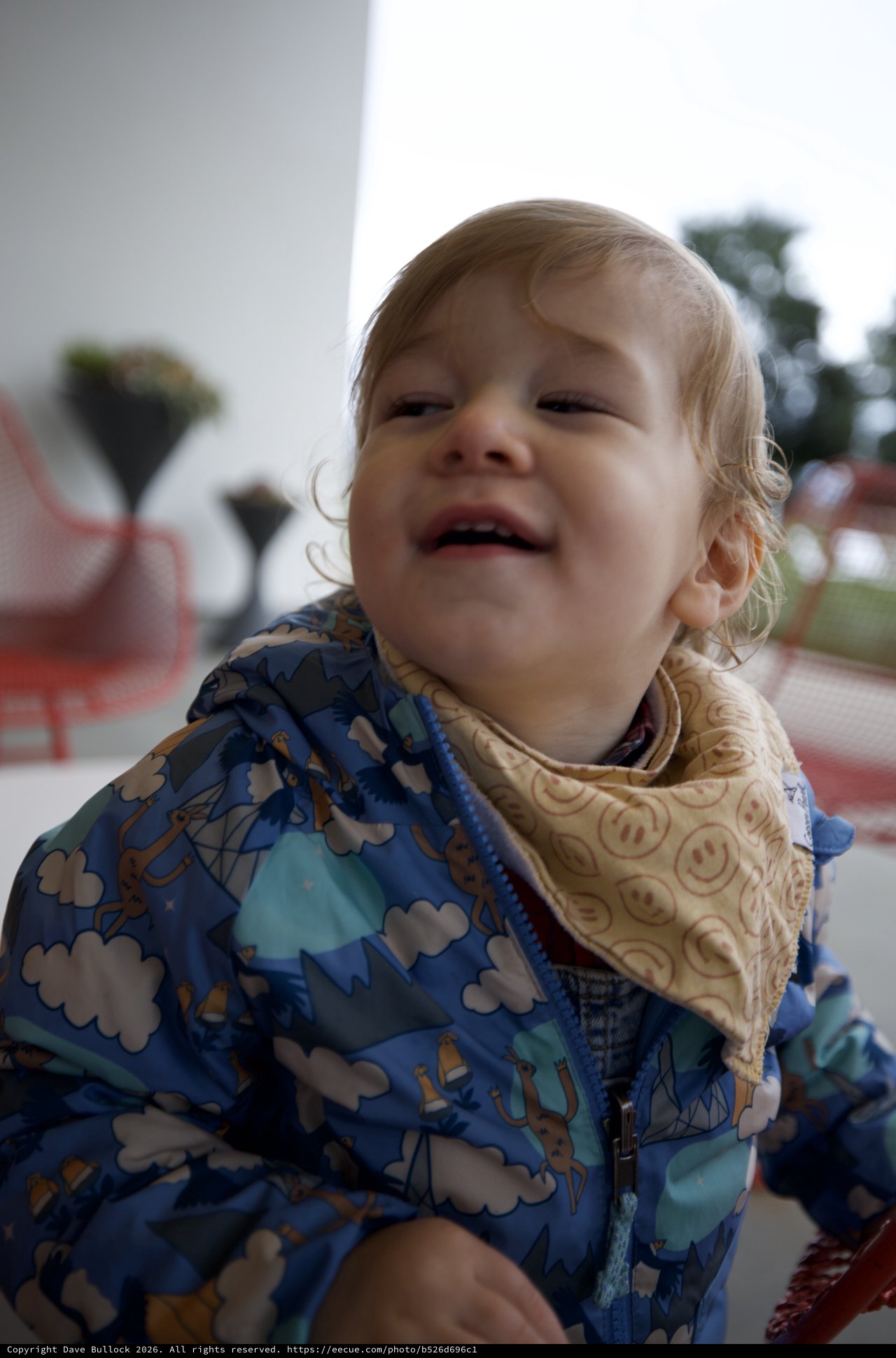 Joyful Toddler in Colorful Winter Jacket