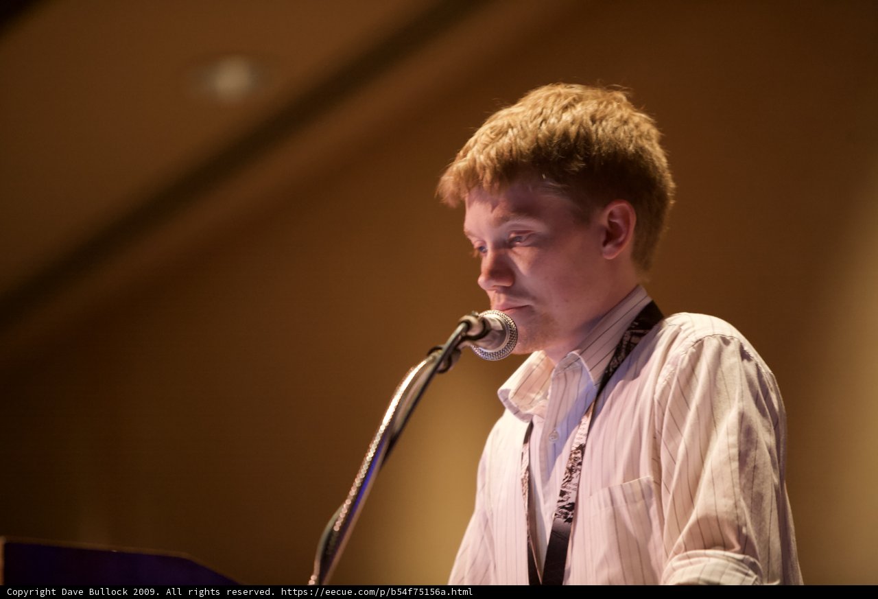 Microphone-Clad Performer Addresses Crowd