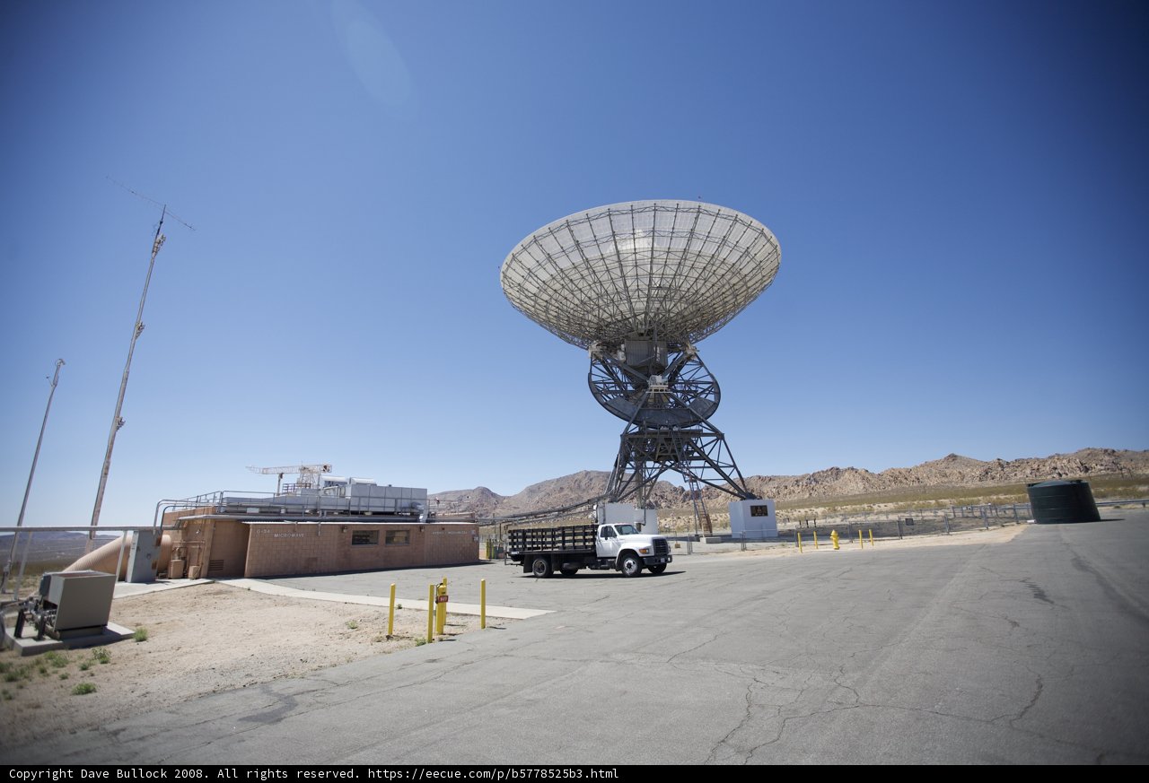 Truck Parking in front of Large Antenna