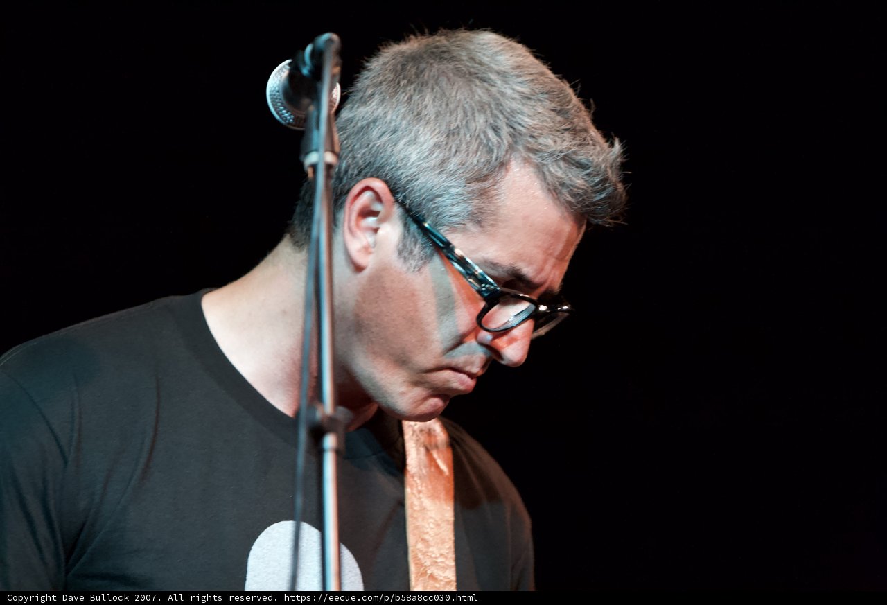 Brett Gurewitz Rocks the Stage with his Guitar and Glasses