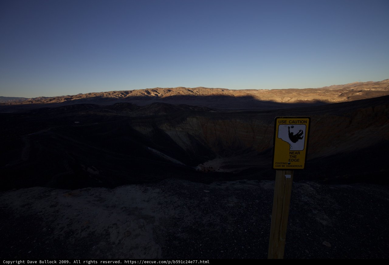Mountain Sign with a View of the Valley