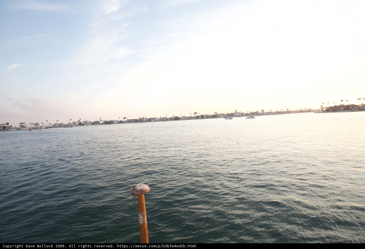 Lone Boat on the Horizon