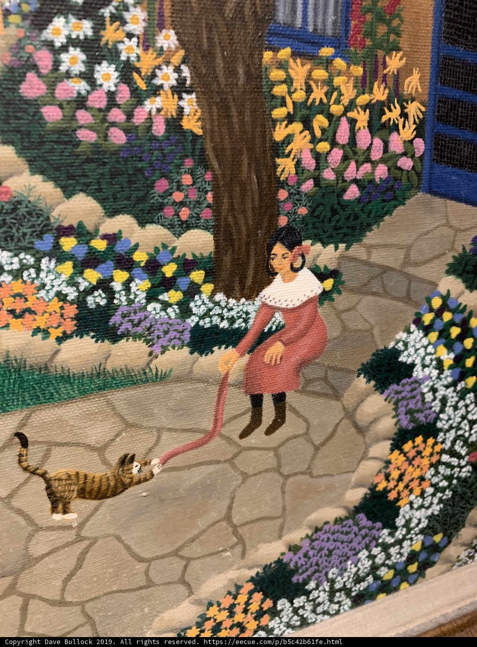 Woman and Cat in a Garden Walkway